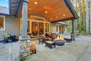a newly built home with a covered outdoor living area