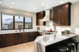 a newly remodeled kitchen with modern fixtures